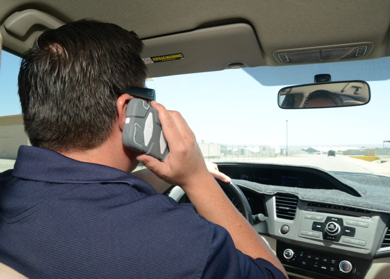 Pedestrian driving while talking on cell phone