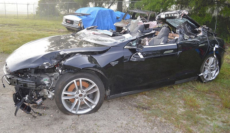A black Tesla car after a car accident in Florida