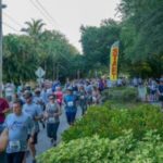 Group of pedestrians running a marathon