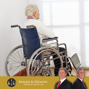 elderly man sitting in a wheelchair in nursing home in florida with attorney