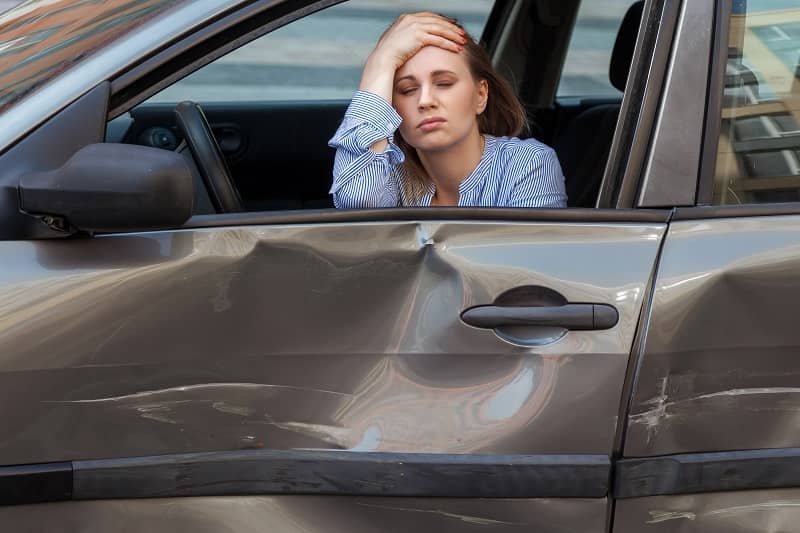 Women siting in car after being struck in auto accident