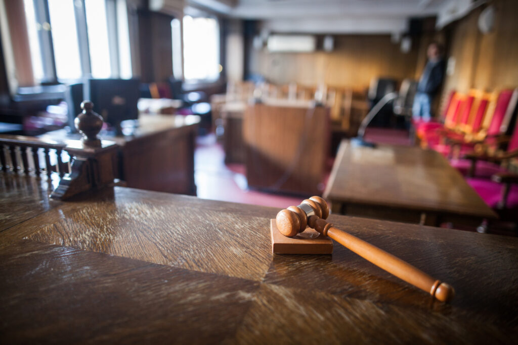 View of a courtroom from the judge's bench with gavel