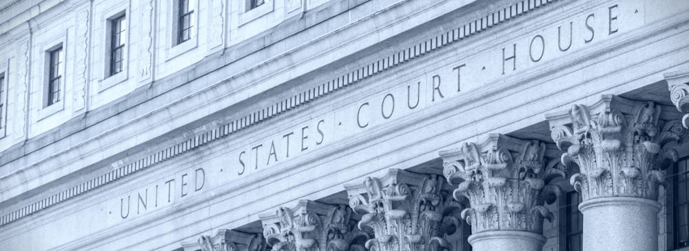 Vignette of the front of a courthouse with the inscription "United States Court House"