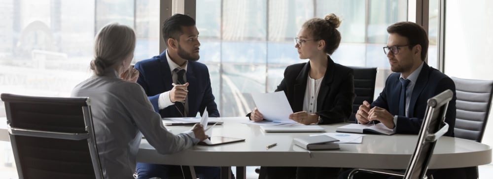 Lawyers sitting at a conference room table