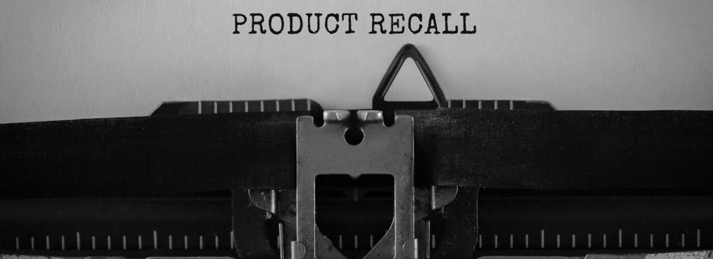 Text Product Recall typed on retro typewriter
