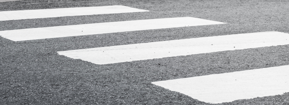 A painted crosswalk on a city street