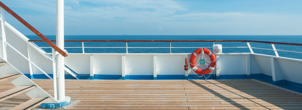 A view of the ocean from the deck of a cruise ship