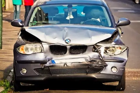 Crashed front of silver BMW