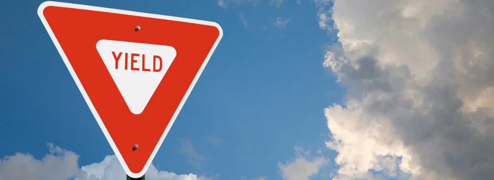 Vignette of a traffic sign instructing drivers to yield